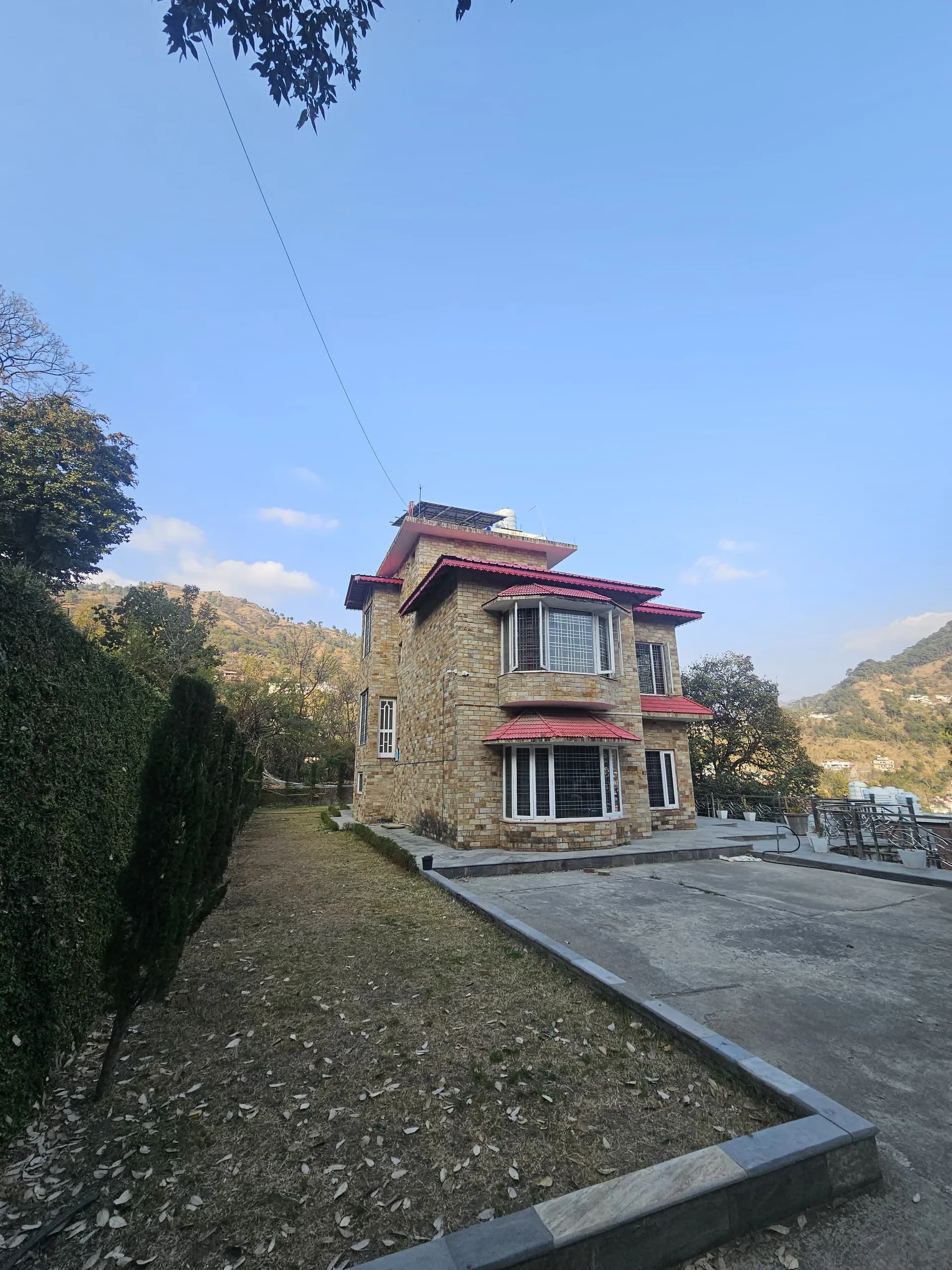 Traditional Kumaoni stone architecture at Obhula Heights